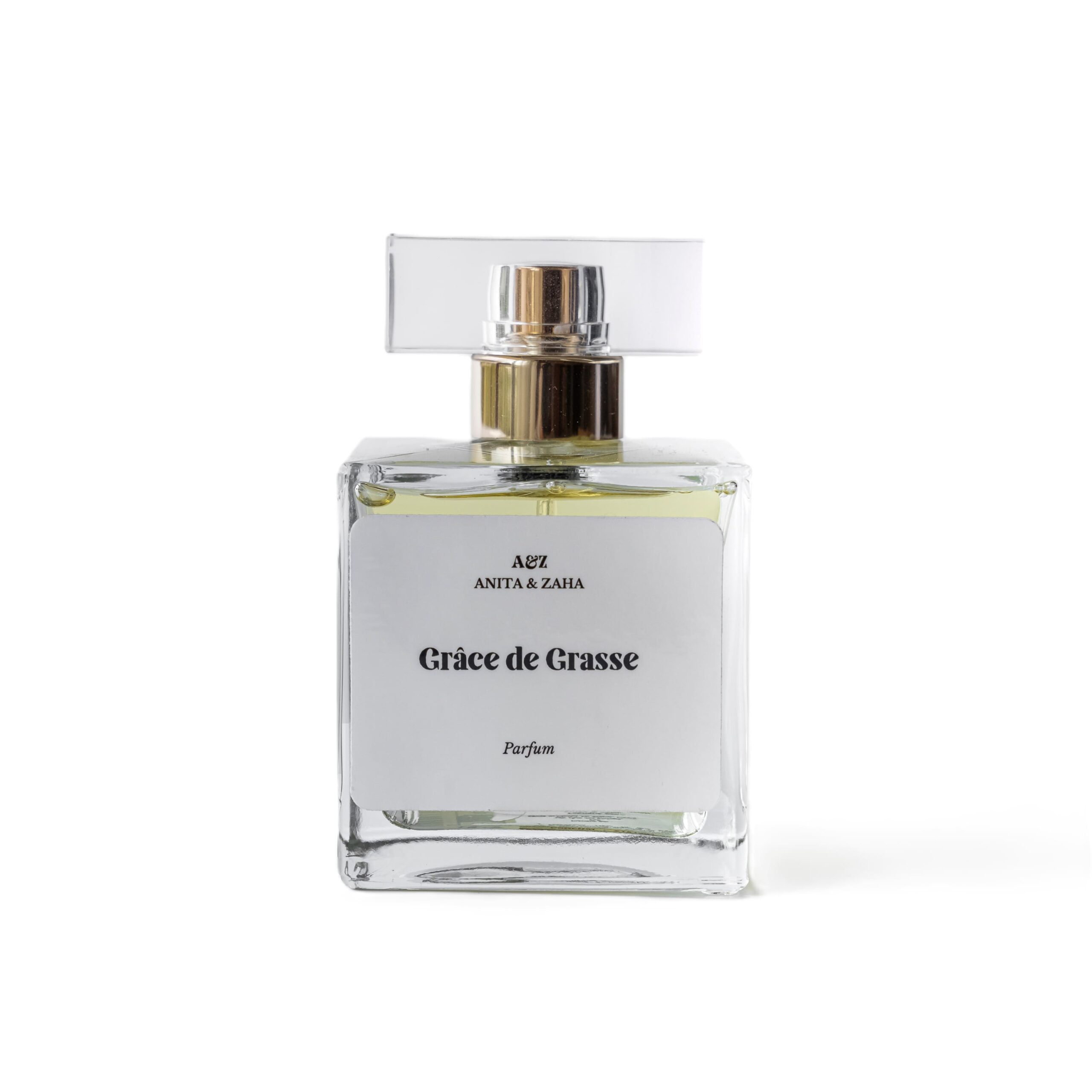 Flacon 100 ml du parfum Grâce de Grasse, en verre transparent avec capot clair, révélant une teinte dorée élégante.