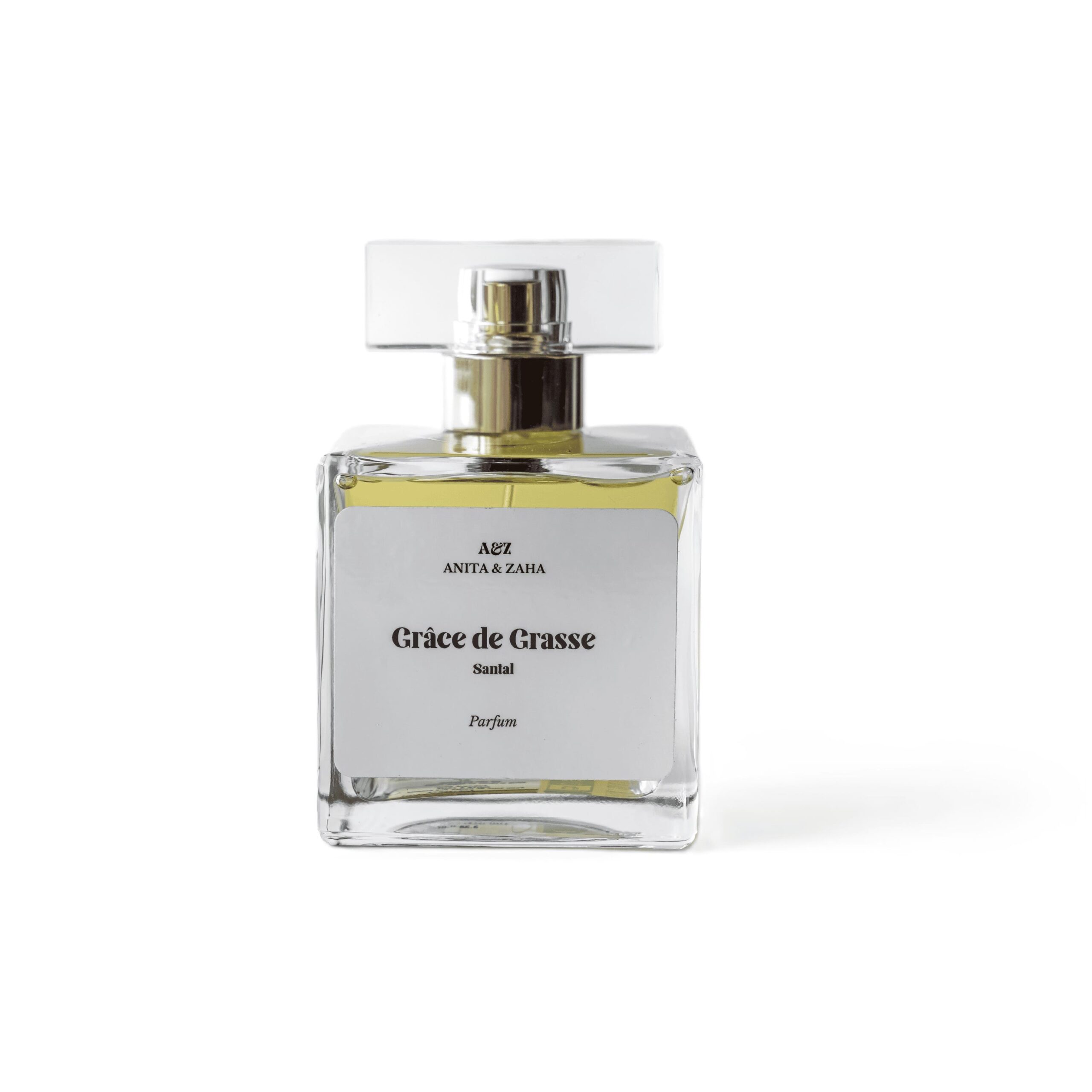 Flacon 100 ml du parfum Grâce de Grasse Santal, en verre transparent avec capot clair, révélant une teinte dorée et une esthétique boisée élégante.